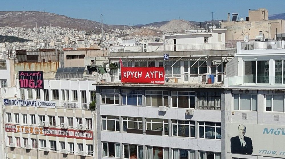 Αποκαθήλωση της Χρυσής Αυγής στον Πειραιά ζητά ο Μπελαβίλας